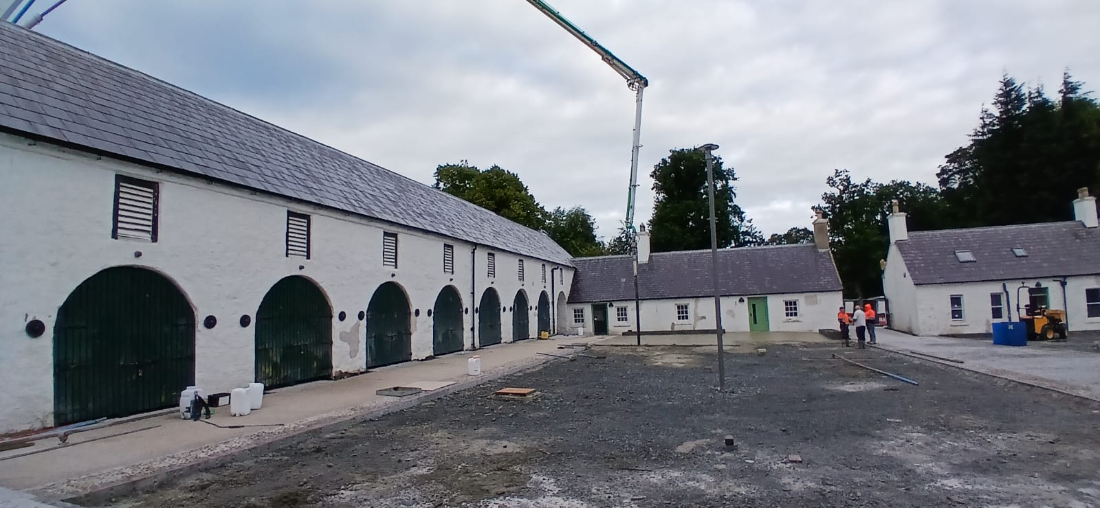 Exposed concrete being spread in Courtyard 1